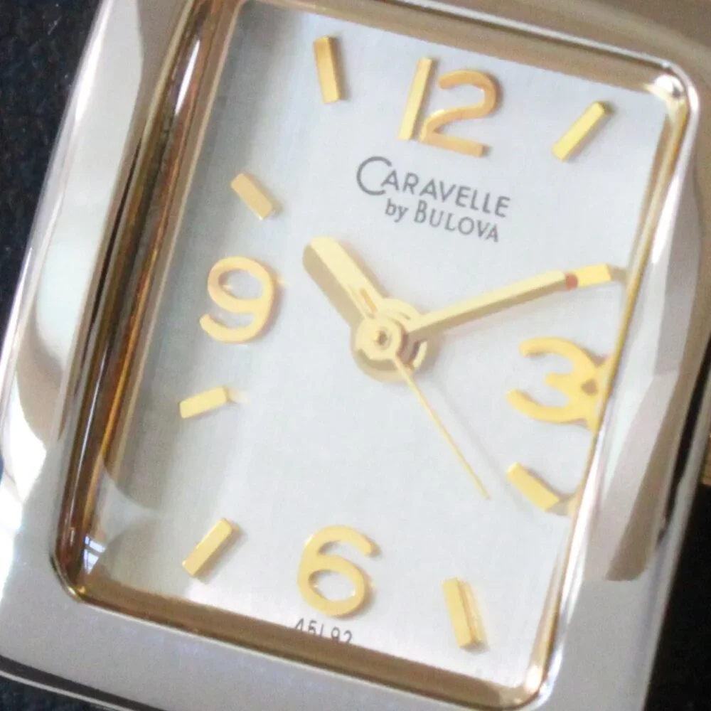 Caravelle Ladies Silver Tone With Gold Accents ½ Bangle Bracelet MOP Dial 16mm
